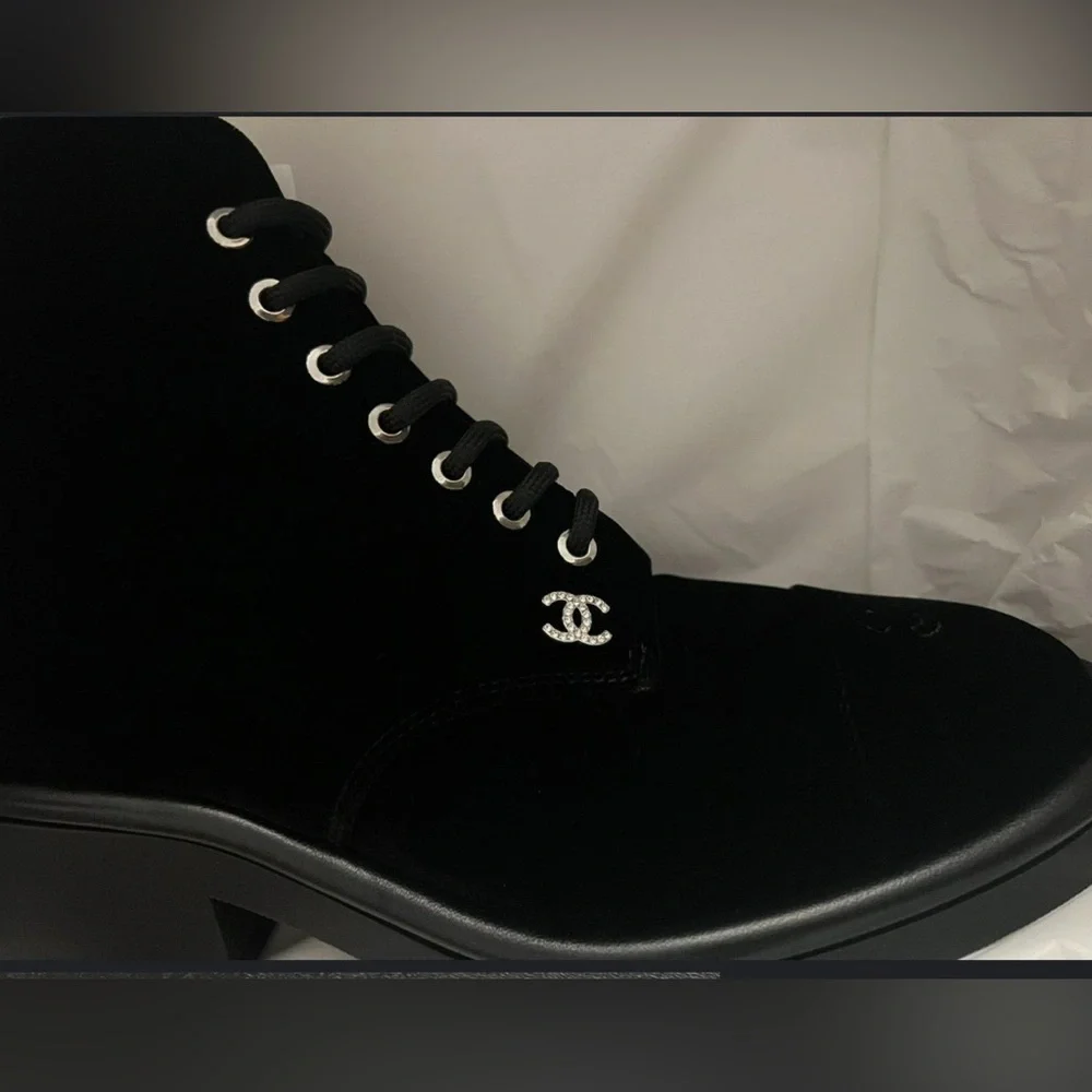 Chanel logo black combat ankle boots